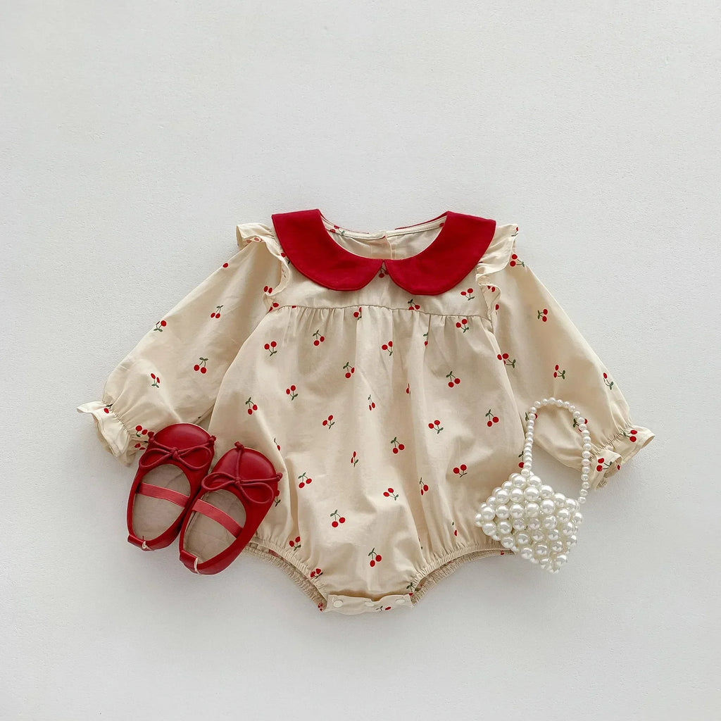 Long-sleeve cotton jumpsuit with cherry print
