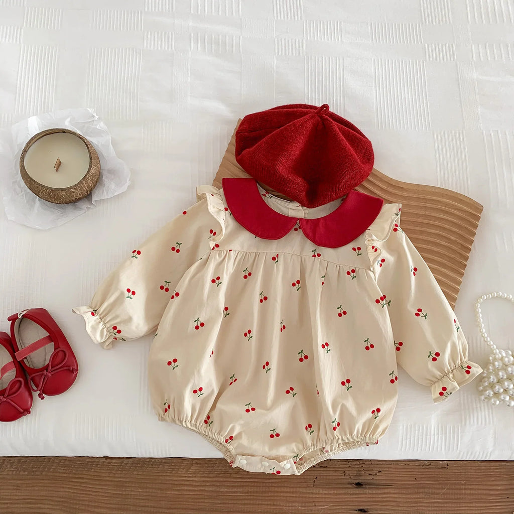 Long-sleeve cotton jumpsuit with cherry print