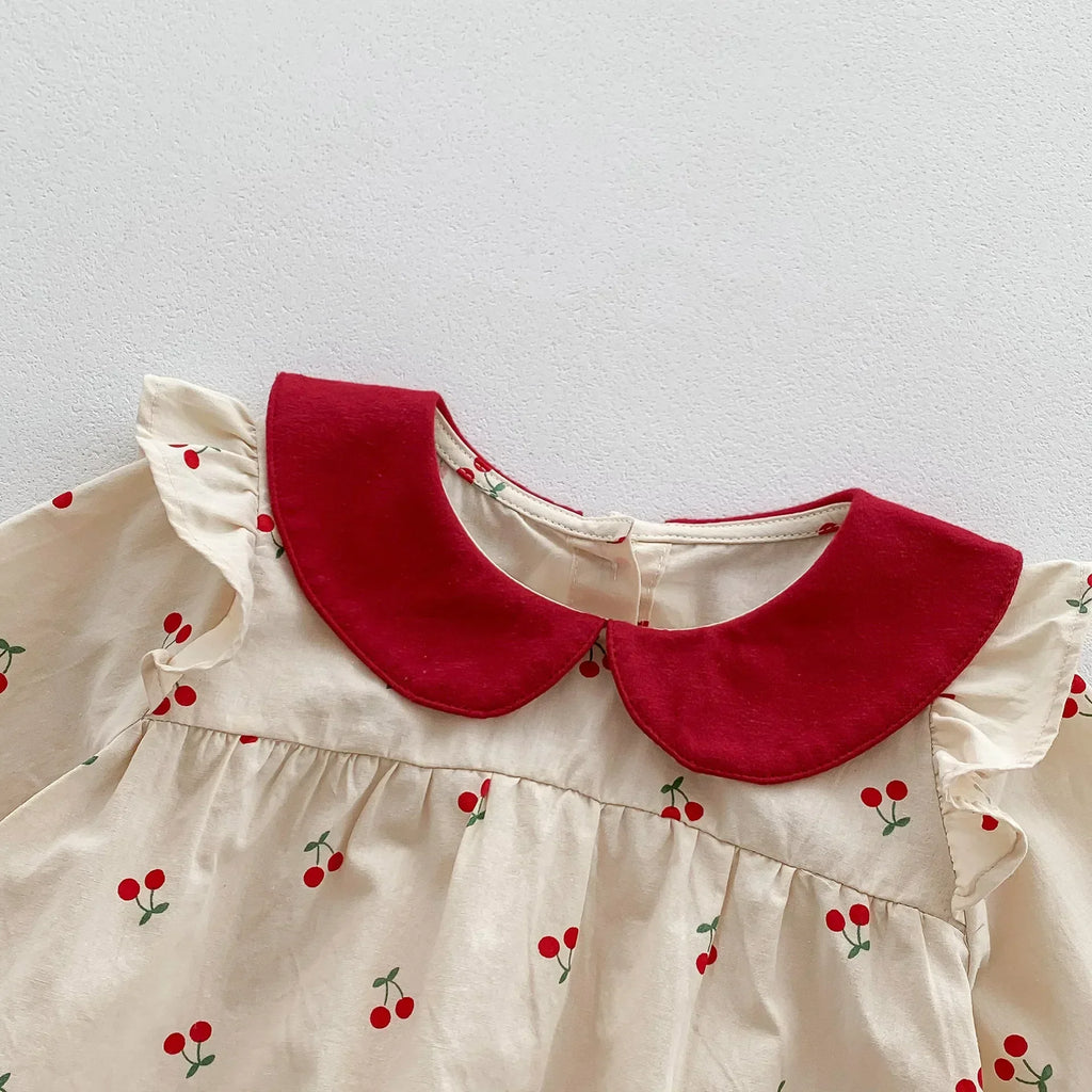 Long-sleeve cotton jumpsuit with cherry print